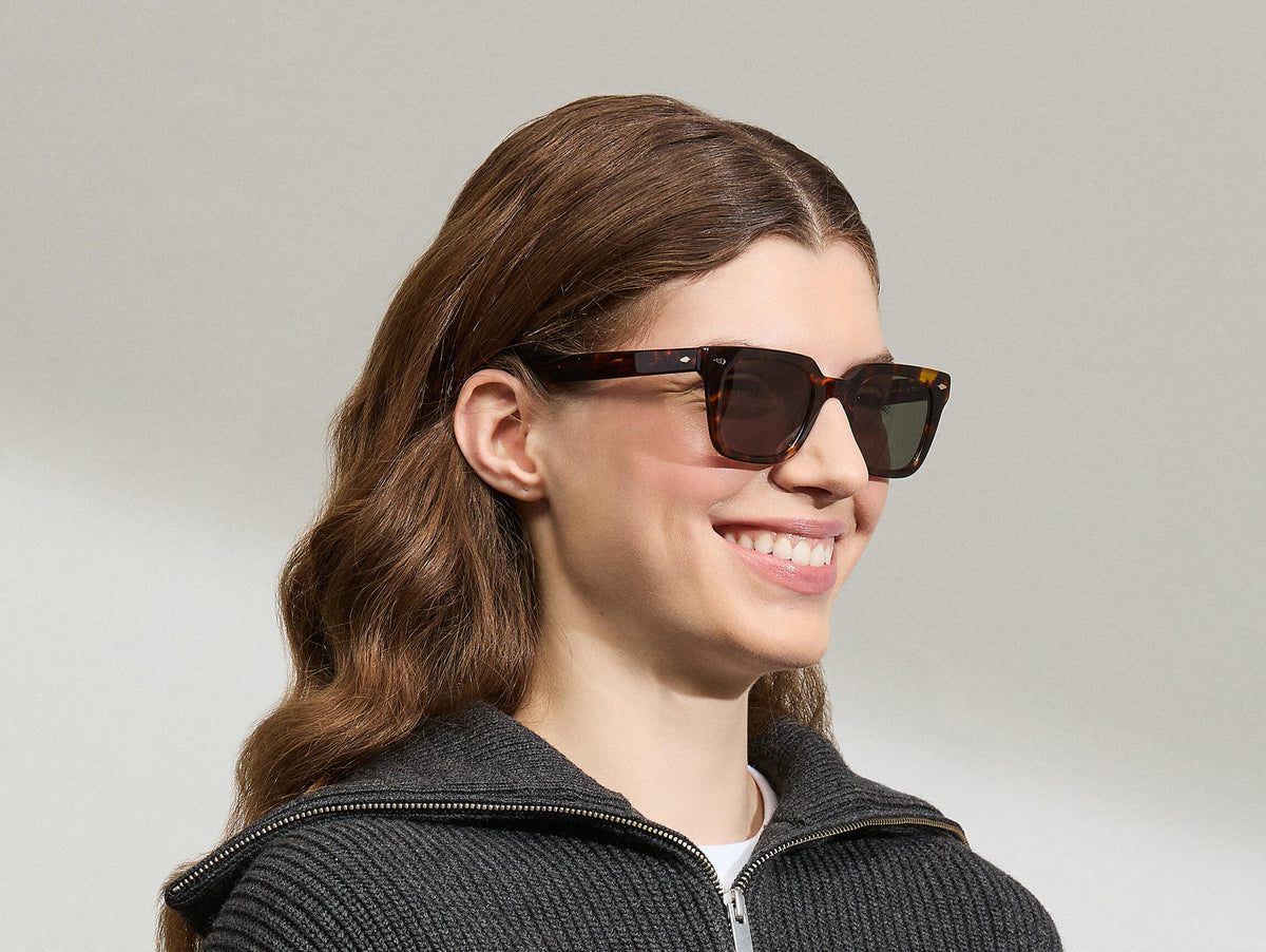 Model is wearing The GROBER SUN in size 48 in Classic Havana with G-15 Tinted Lenses