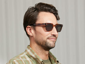 Model is wearing The GROBER SUN in Tobacco in size 48 with G-15 Lenses