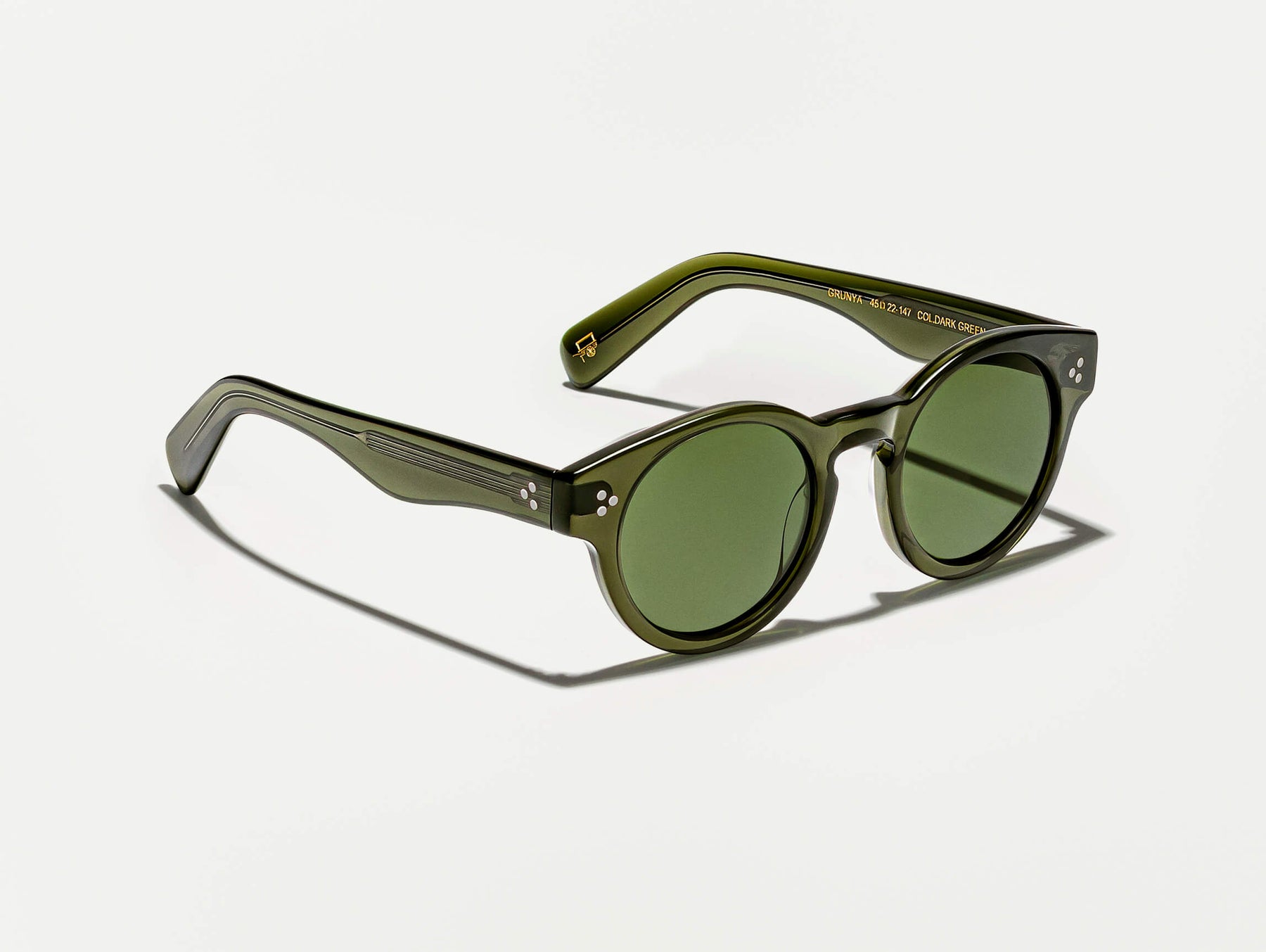The GRUNYA SUN in Dark Green with Calibar Green Glass Lenses