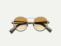 #color_gold/dark green | The KANAKA SUN in Gold/Dark Green with Chestnut Fade Tinted Lenses