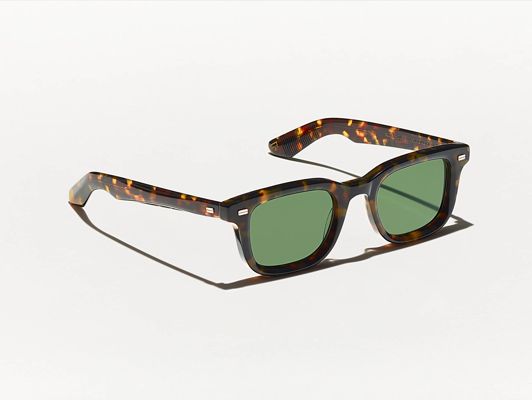 The KLUTZ SUN in Tortoise with Green Lenses