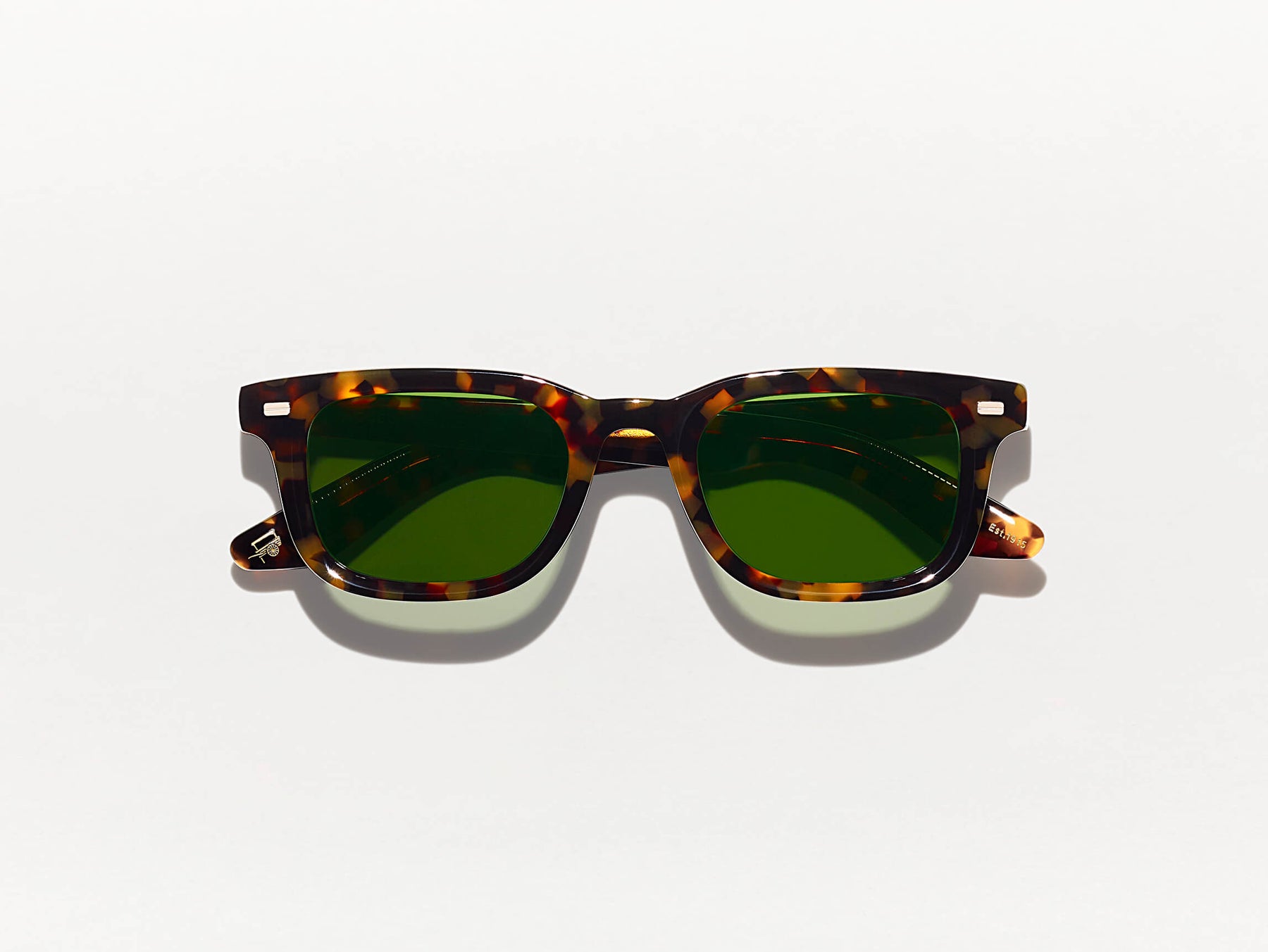 The KLUTZ SUN in Tortoise with Green Lenses