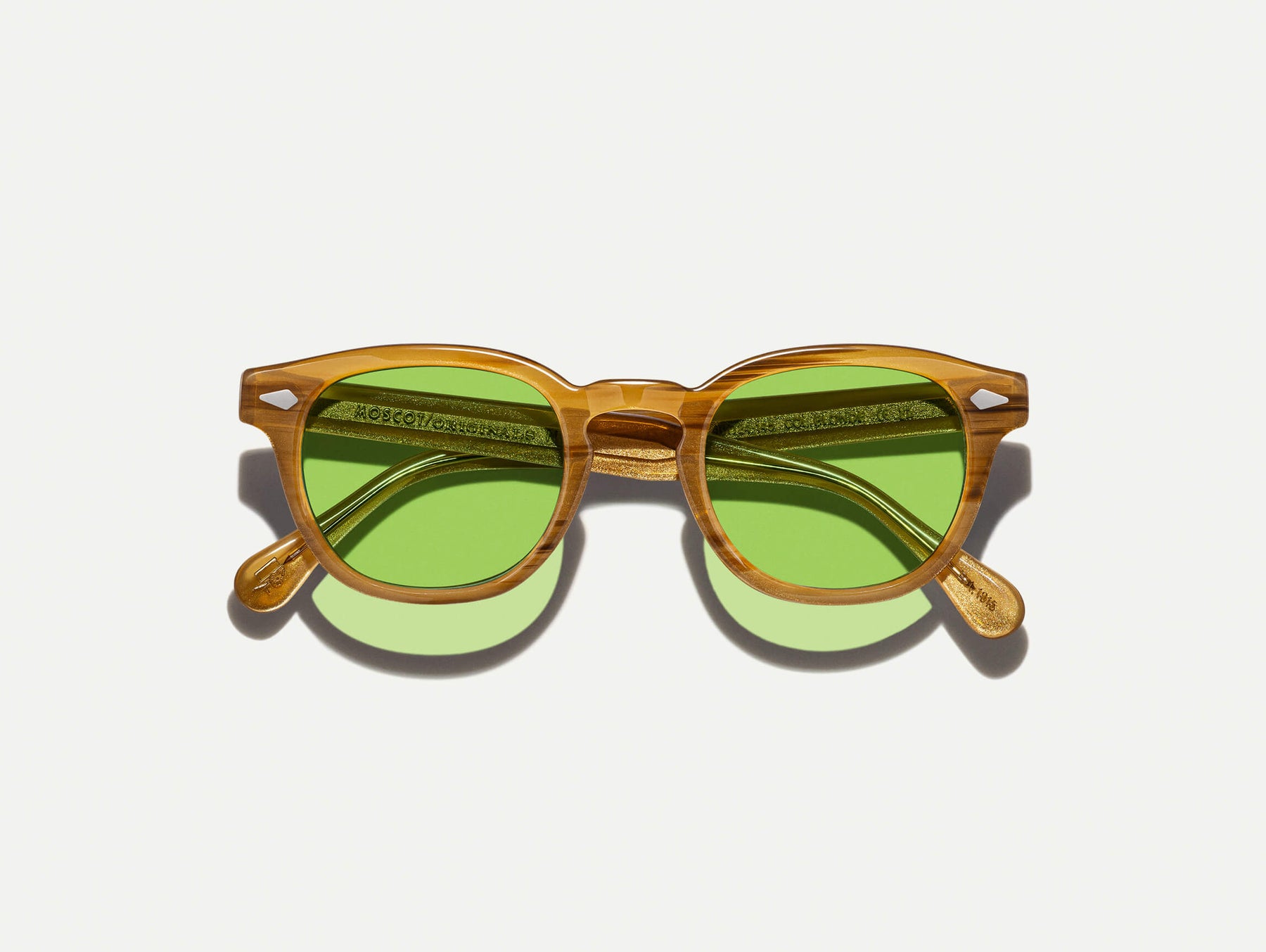 The LEMTOSH Blonde with Garnet Green Tinted Lenses