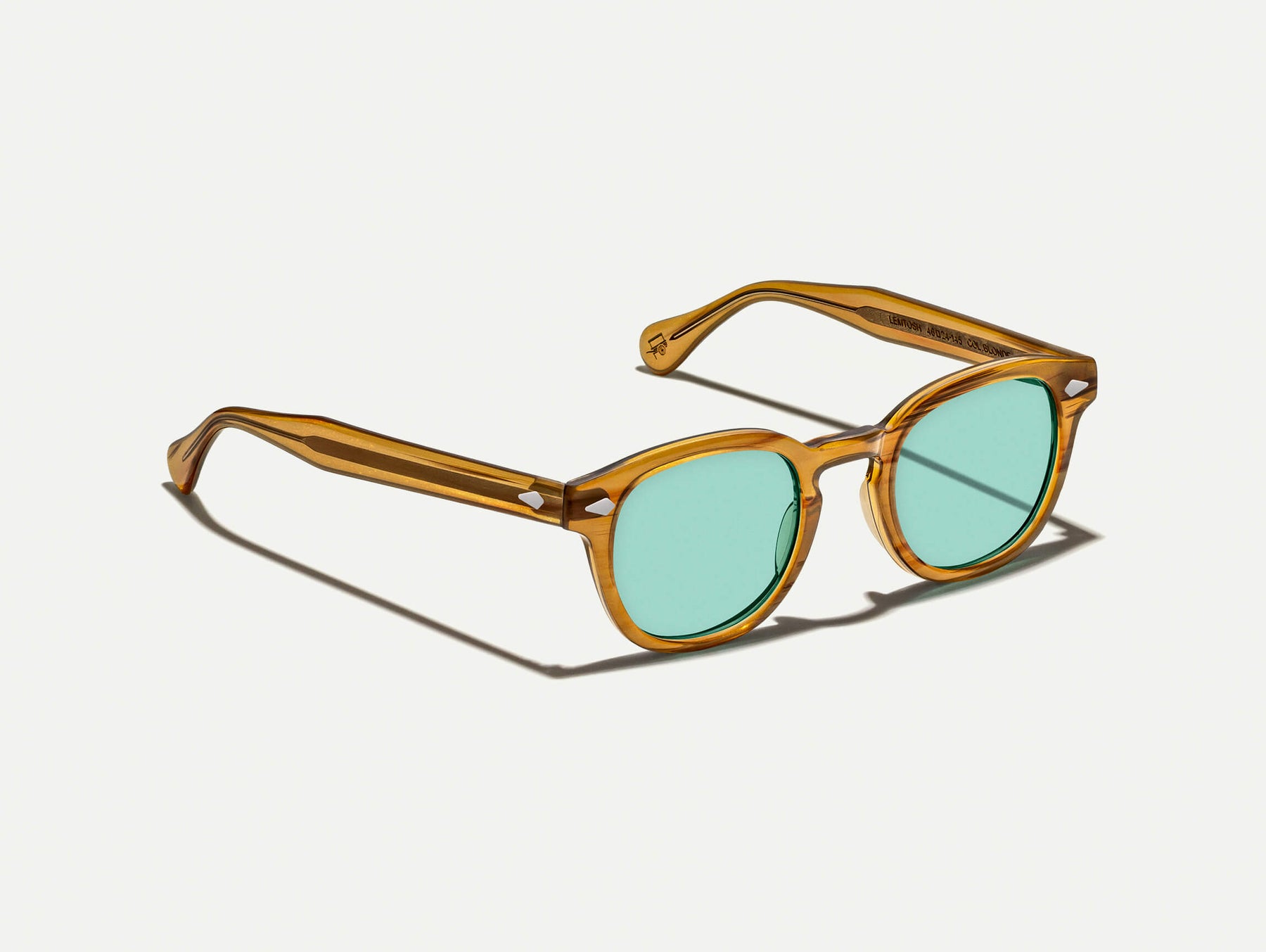 The LEMTOSH Blonde with Turquoise Tinted Lenses