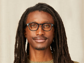 Model is wearing The LEMTOSH w/ Metal Nose Pads in size 46 in Black