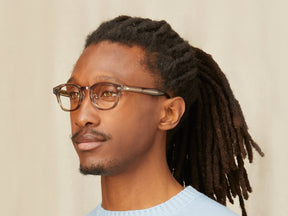 Model is wearing The LEMTOSH w/ Metal Nose Pads in size 46 in Brown Ash