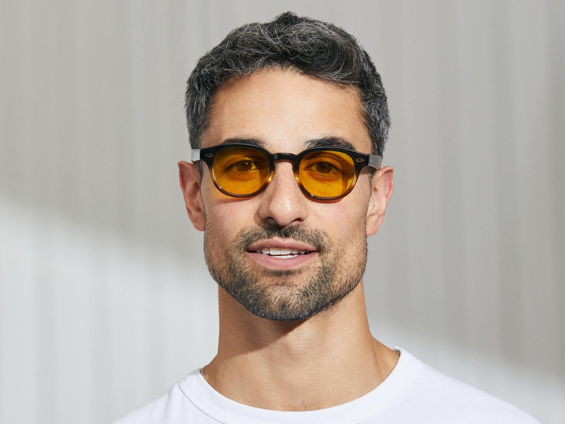Model is wearing The LEMTOSH in Grey-Brown Fade in size 46 with Mellow Yellow Tinted Lenses