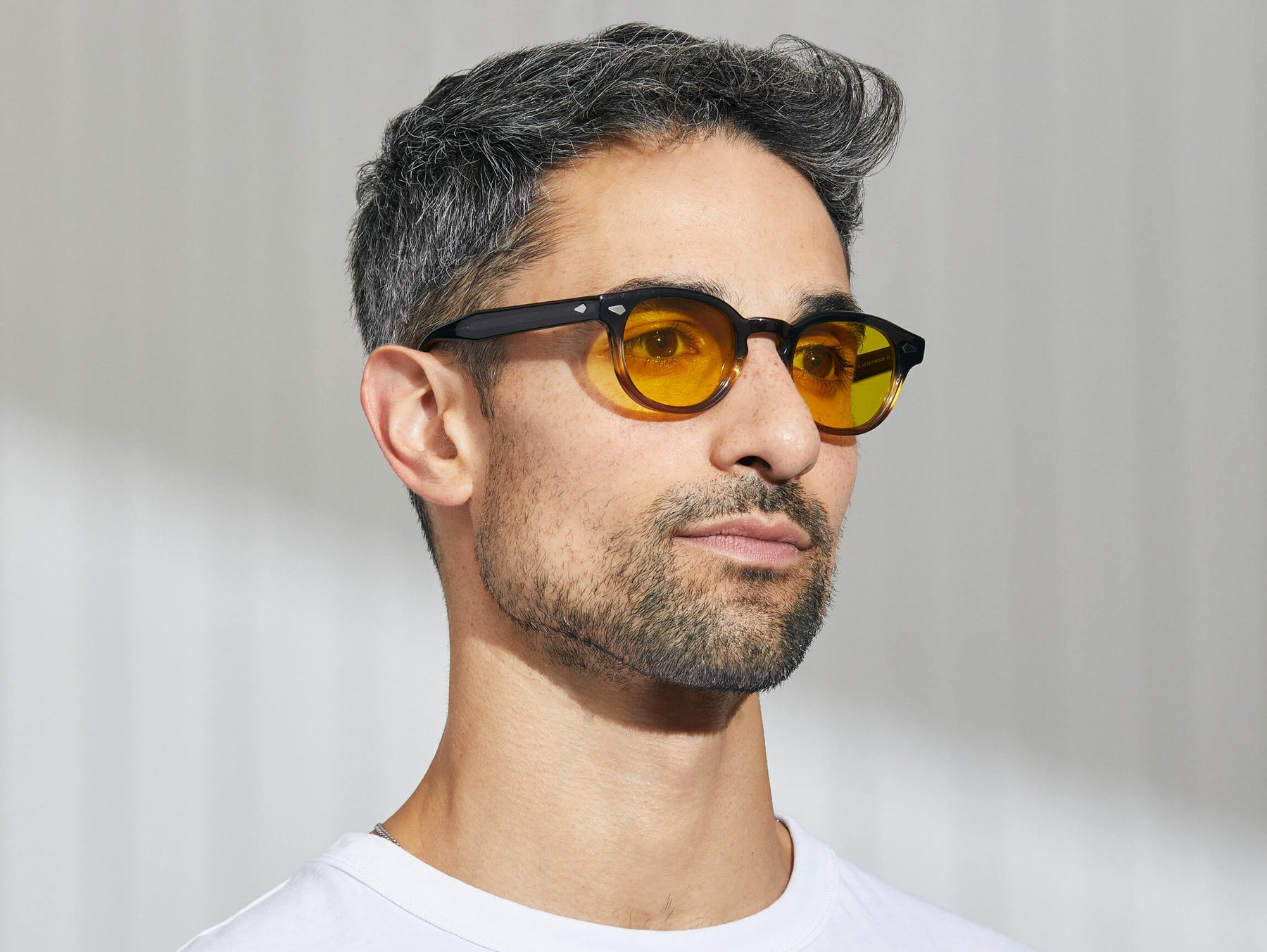 Model is wearing The LEMTOSH in Grey-Brown Fade in size 46 with Mellow Yellow Tinted Lenses