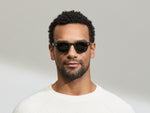 Model is wearing The LEMTOSH SUN-POLARIZED in size 46 in Matte Black with Grey Glass Polarized Lenses