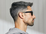 Model is wearing The LEMTOSH SPORT in Black in size 46 with G-15 Polarized Nylon Lenses