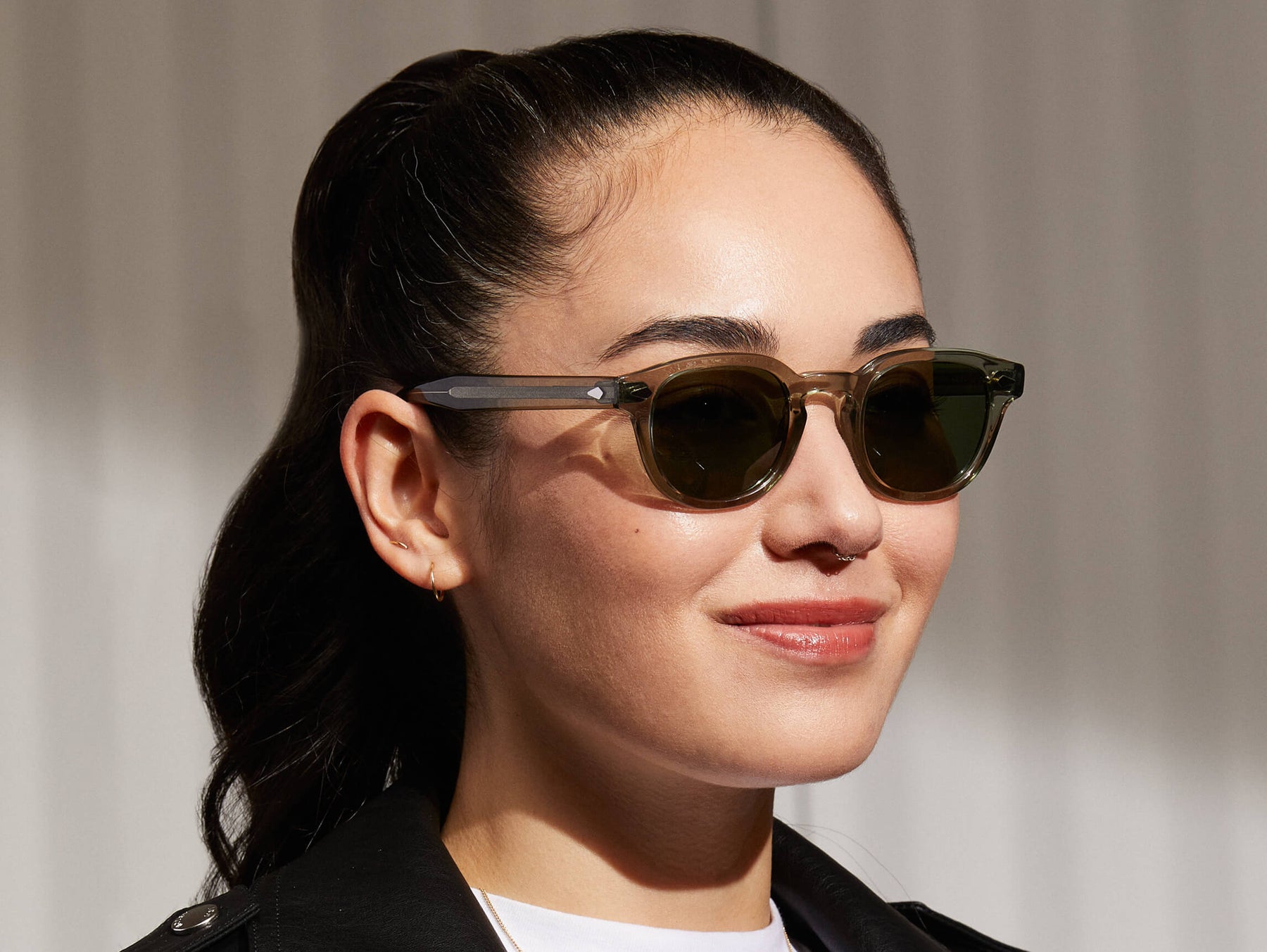 Model is wearing The LEMTOSH SUN in Sage in size 44 with G-15 Glass Lenses