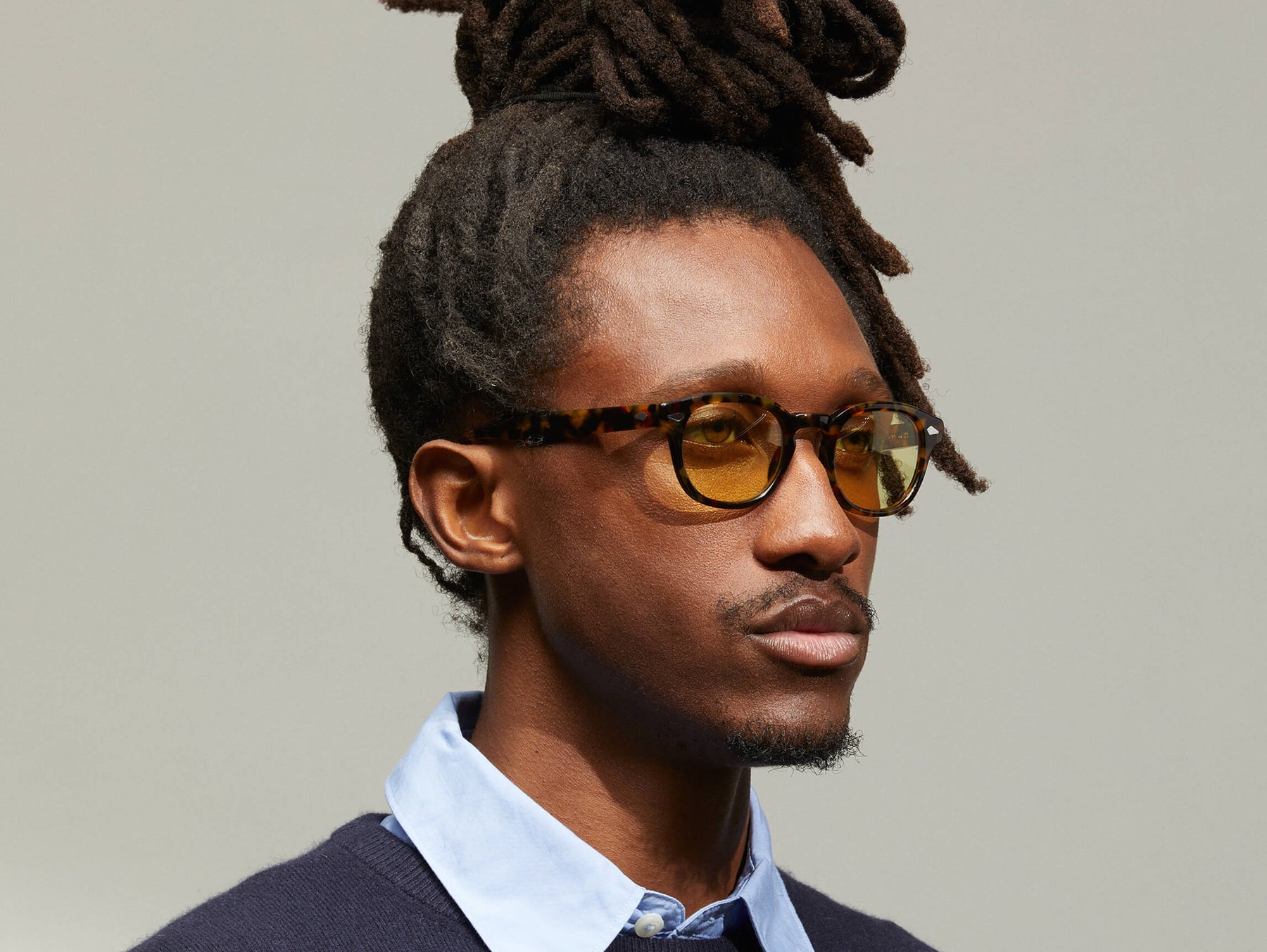 Model is wearing The LEMTOSH in Tortoise in size 46 with Pastel Yellow Tinted Lenses