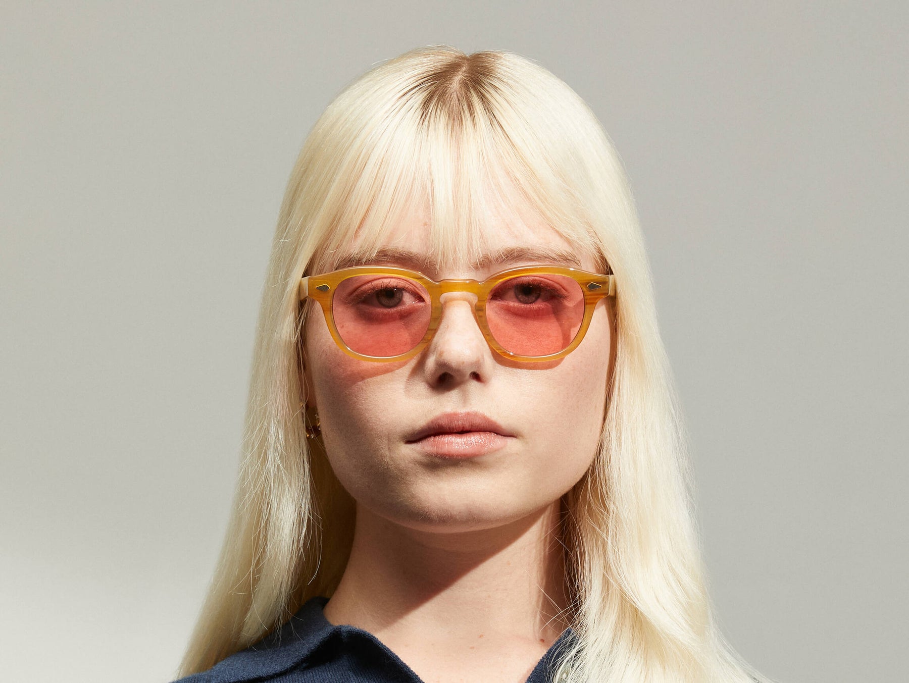 Model is wearing The LEMTOSH in  Blonde size 46 with ROSE+ Tinted Lenses