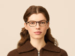 Model is wearing The LIKTIG in size 50 in Spot Tortoise