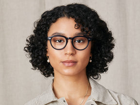 Model is wearing The MAYDELA in size 49 in Navy