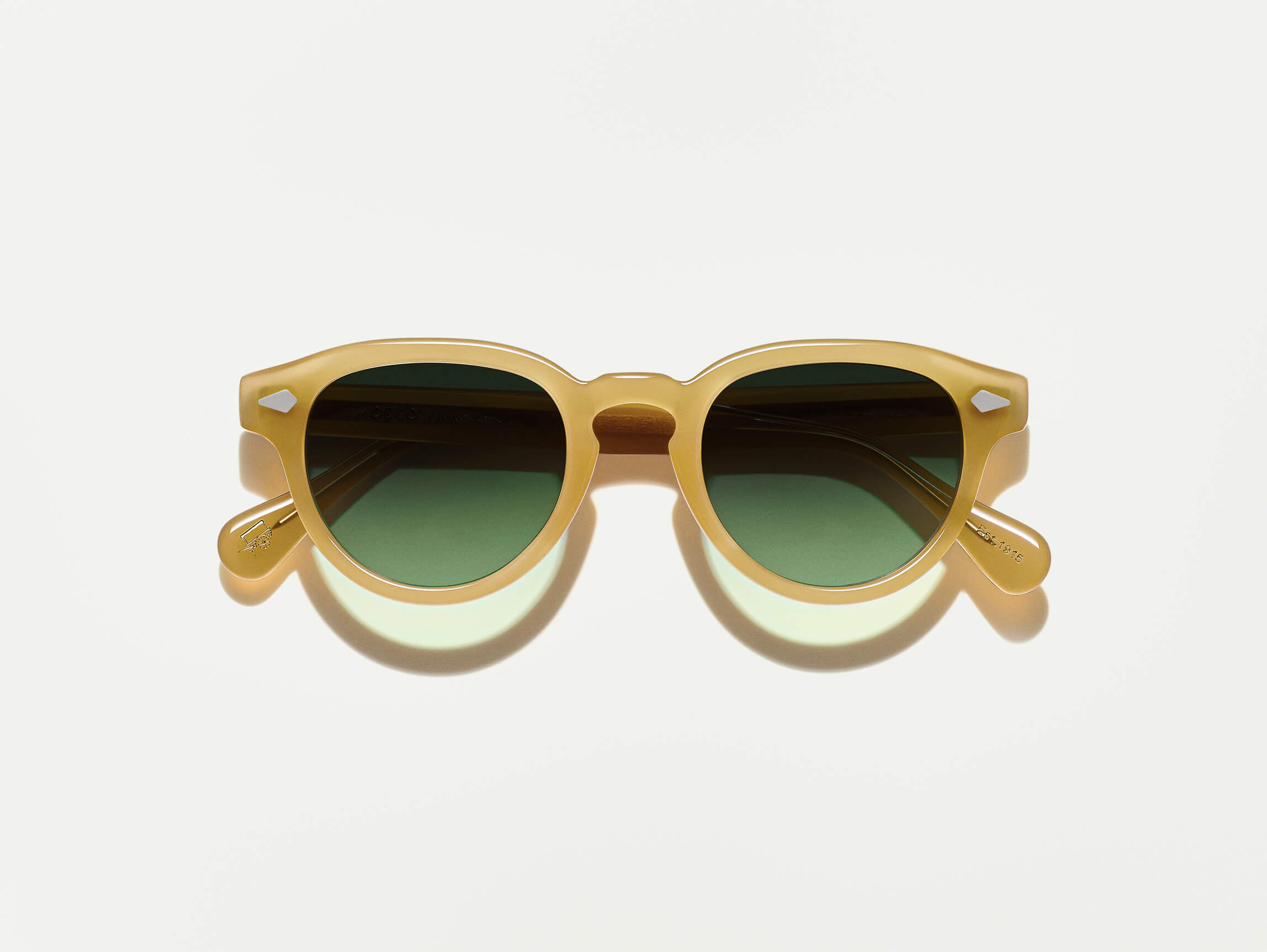 The MAYDELA SUN in Goldenrod with Forest Wood Tinted Lenses