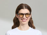 Model is wearing the MILTZEN in Black in size 49 with AMBER+ Lenses
