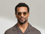 Model is wearing the MILTZEN in Citron/Tortoise in size 46 with AMBER+ Lenses