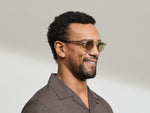 Model is wearing the MILTZEN in Citron/Tortoise in size 46 with AMBER+ Lenses