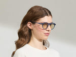 Model is wearing the MILTZEN in Sapphire in size 49 with AMBER+ Lenses