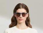 Model is wearing the MILTZEN in Sapphire in size 49 with AMBER+ Lenses