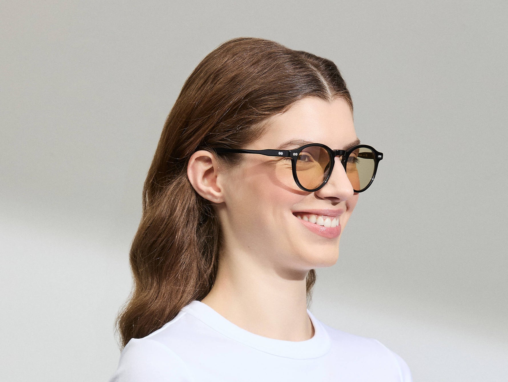 Model is wearing the MILTZEN in Black in size 49 with AMBER+ Lenses
