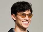 Model is wearing The MILTZEN in Blonde in size 46 with Amber Tinted Lenses