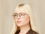 Model is wearing The MIZER in size 51 in Light Blue