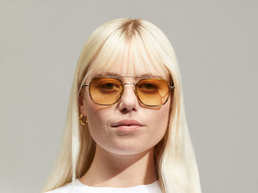 Model is wearing The MIZER SUN in size 54 in Bamboo with Chestnut Fade Tinted Lenses