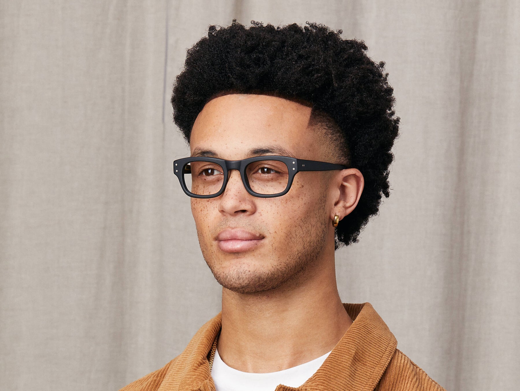 Model is wearing The NEBB in size 48 in Matte Black