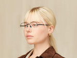 Model is wearing The PLOTZ in size 49 in Navy