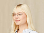 Model is wearing The PLOTZ in size 49 in Silver