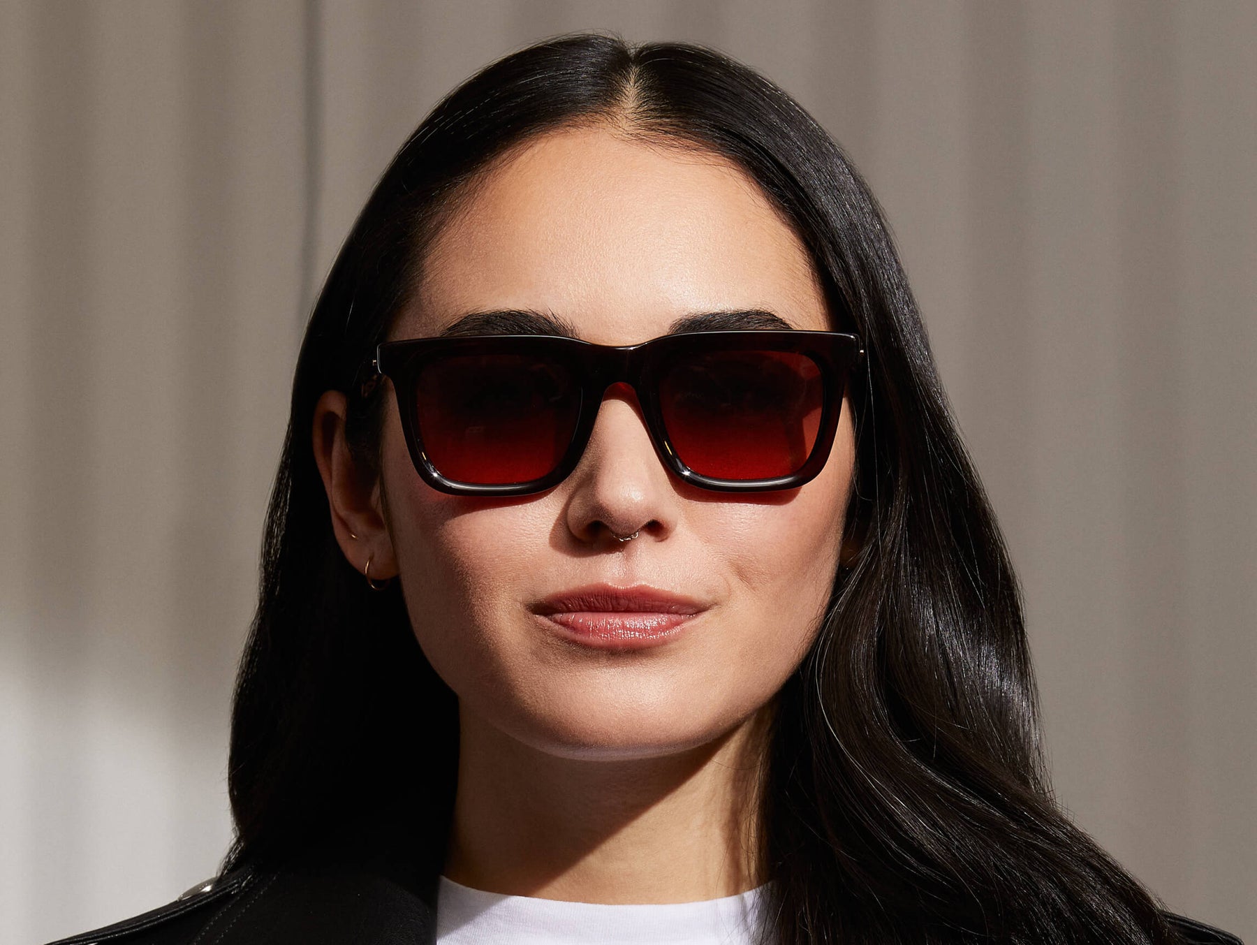 Model is wearing The RIZIK SUN in Burgundy in size 49 with Cabernet Tinted Lenses