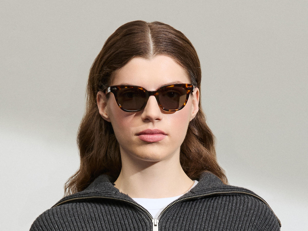Model is wearing The SHANEKITE SUN in Classic Havana in size 49 with G-15 Tinted Lenses
