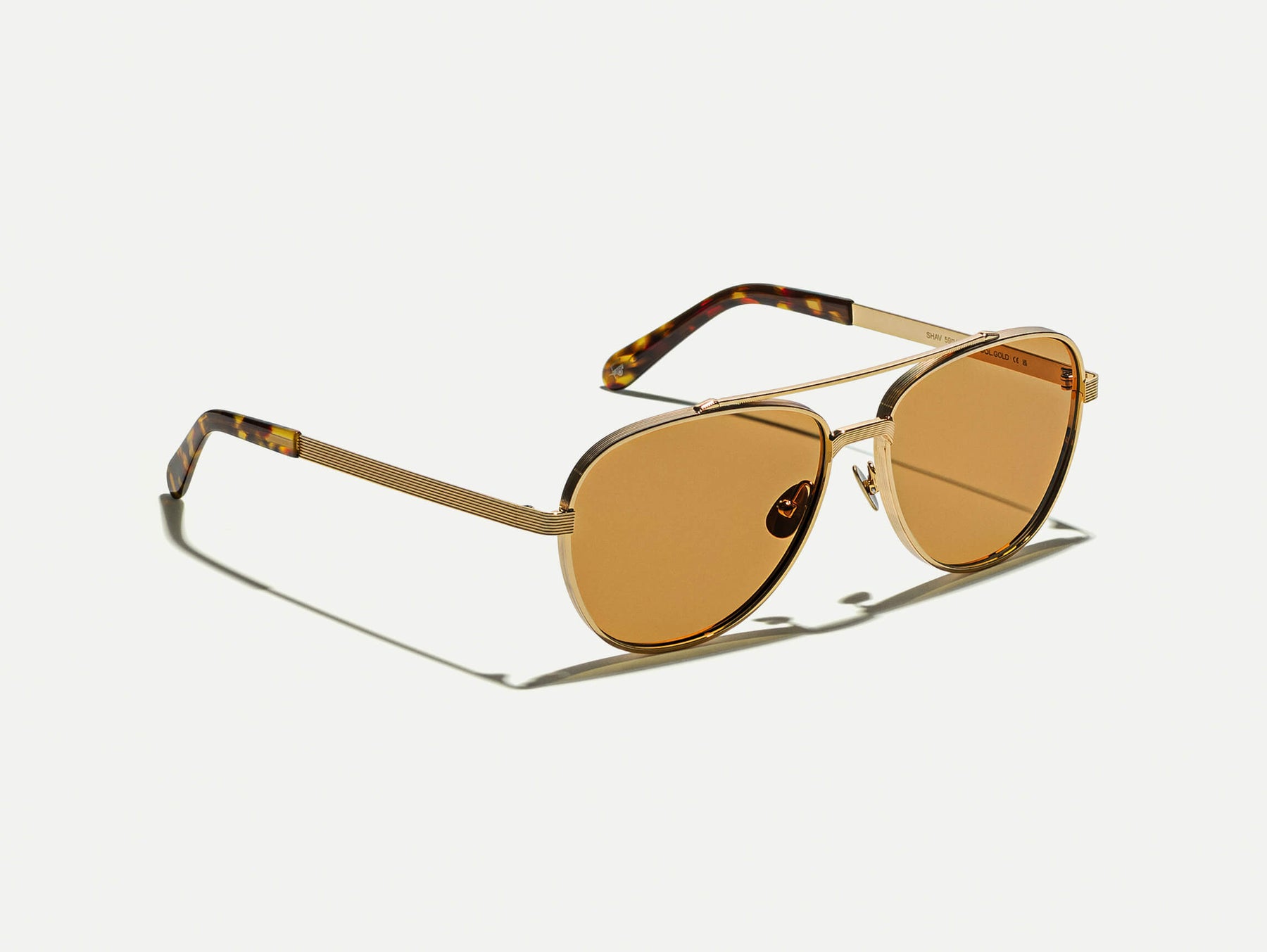 The SHAV SUN in Gold with Amber Tinted Lenses