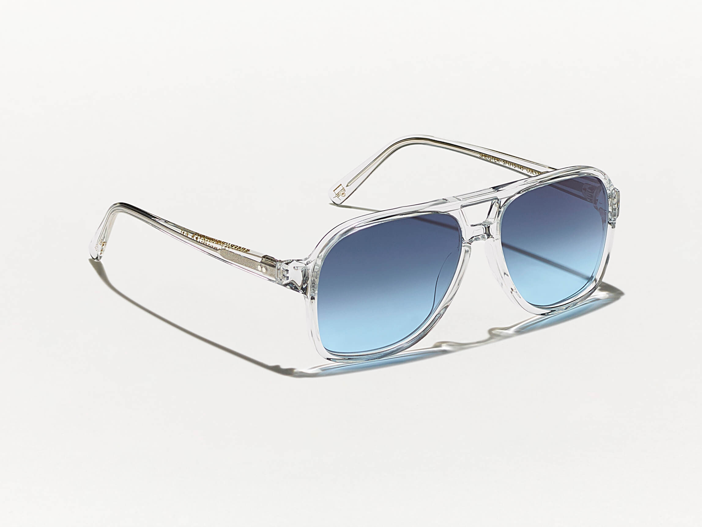 #color_crystal | The SHEISTER SUN in Crystal with Denim Blue Tinted Lenses