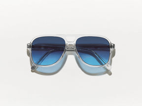 The SHEISTER SUN in Crystal with Denim Blue Tinted Lenses