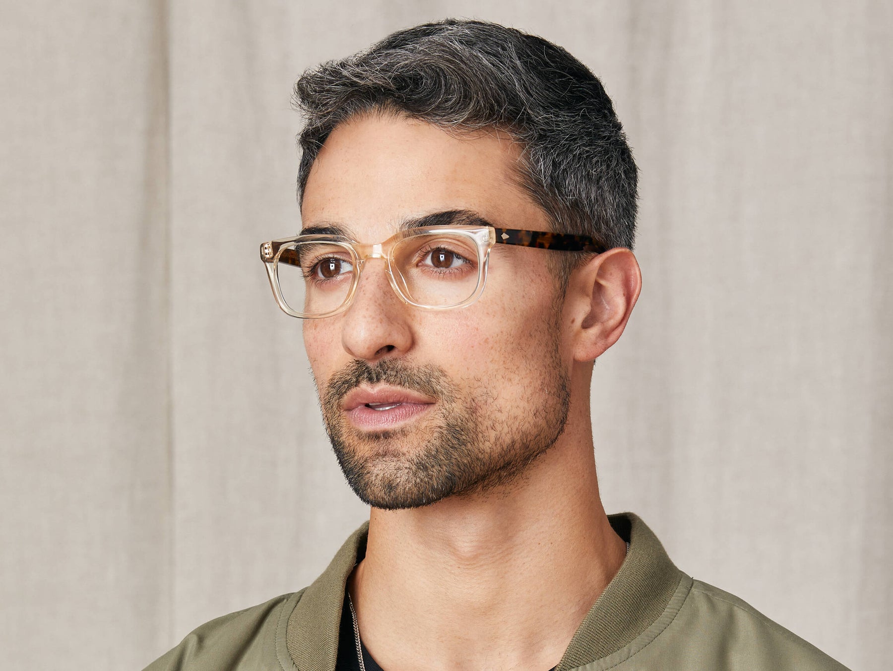 Model is wearing The SHIDDOCK in size 49 in Flesh/Tortoise