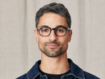 Model is wearing The SHIDDOCK in size 49 in Grey