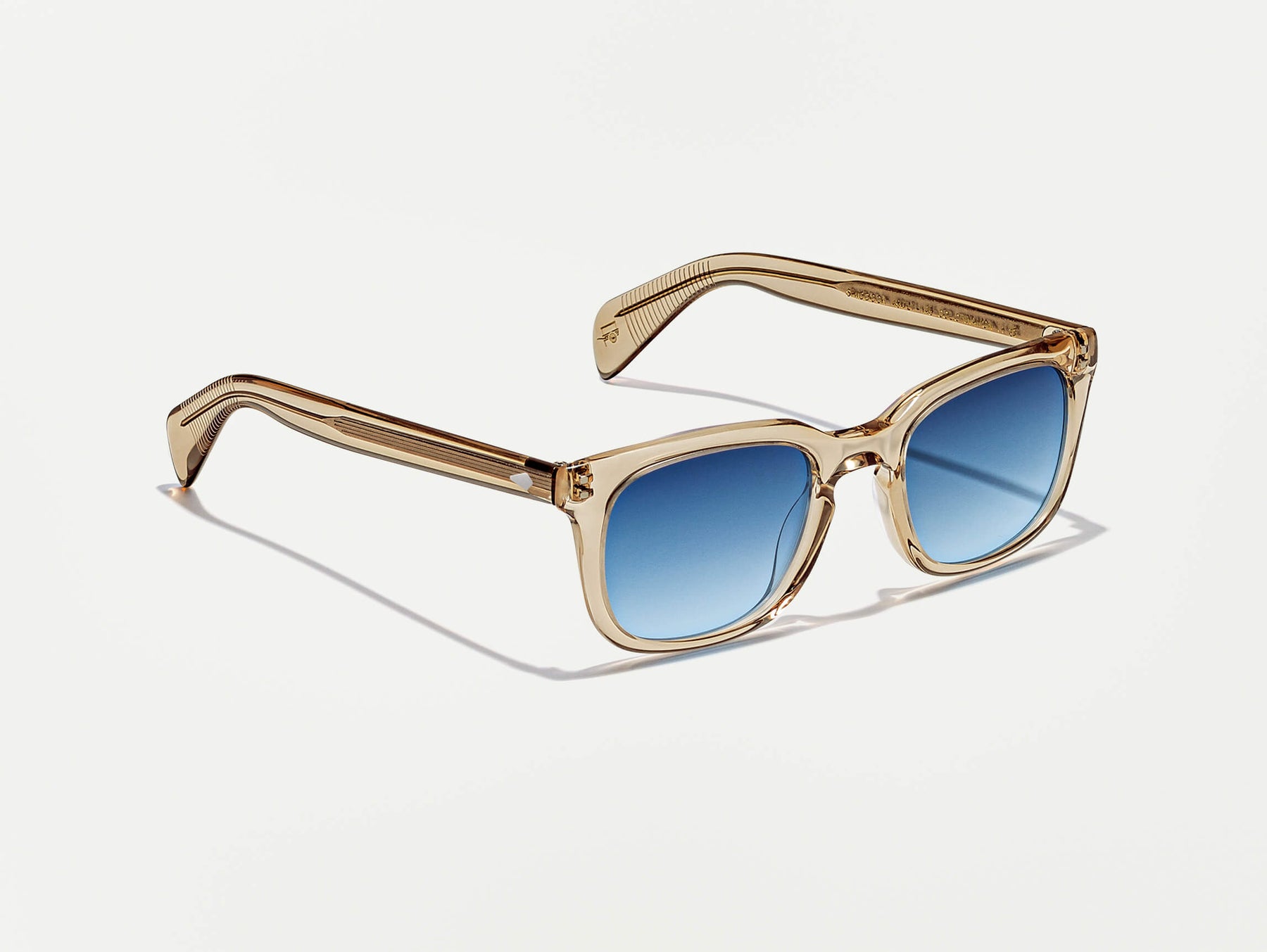 The SHIDDOCK SUN in Cinnamon with Denim Blue Tinted Lenses