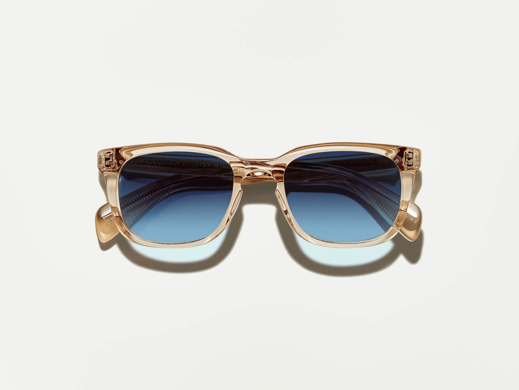 The SHIDDOCK SUN in Cinnamon with Denim Blue Tinted Lenses