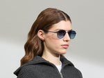 Model is wearing The SHMECKEL SUN in size 53 in Navy with Denim Blue Tinted Lenses