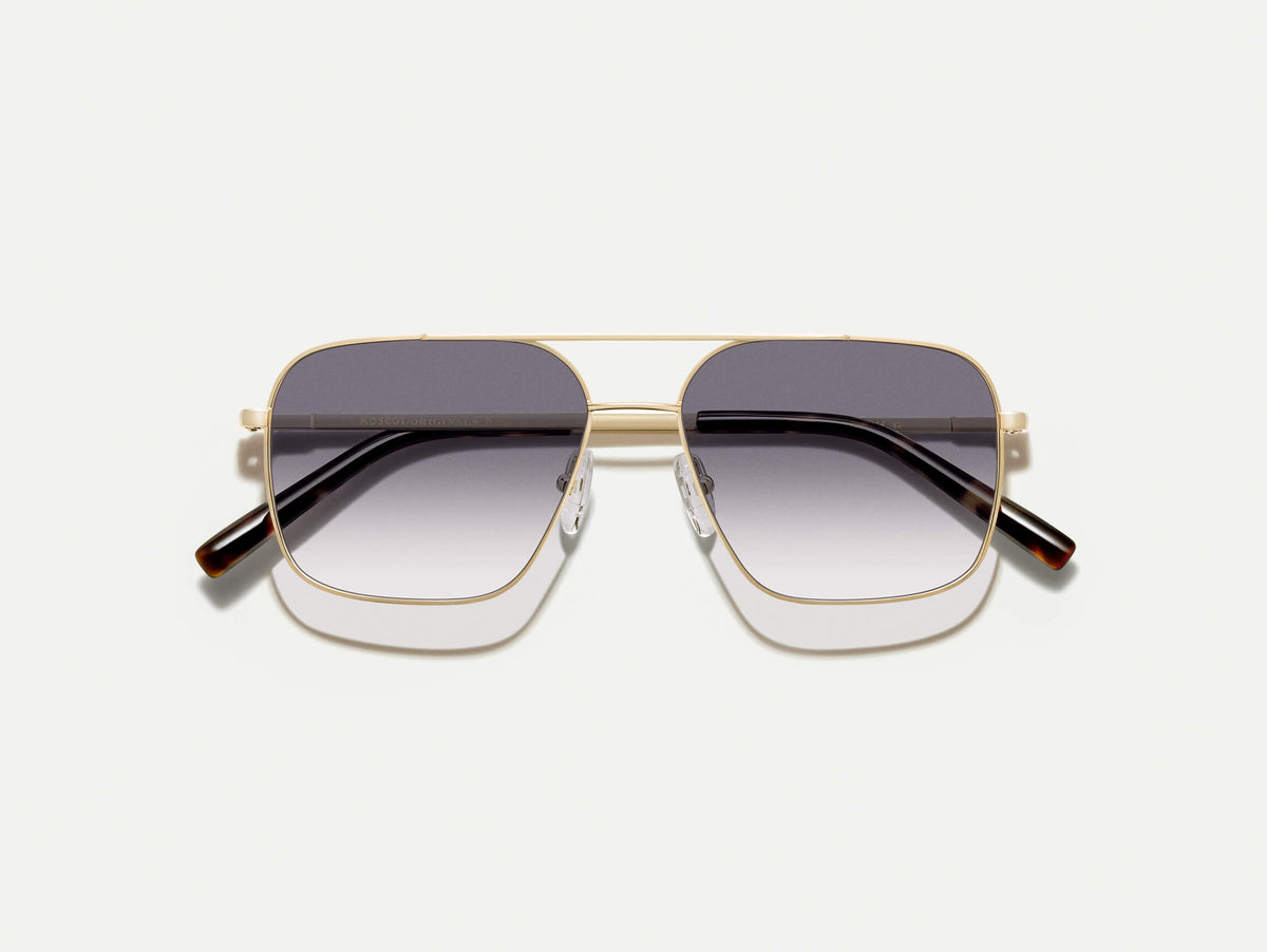 The SHTARKER in Gold with American Grey Fade Tinted Lenses