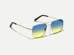 The SHTARKER in Gold with Aqua Sunrise Tinted Lenses