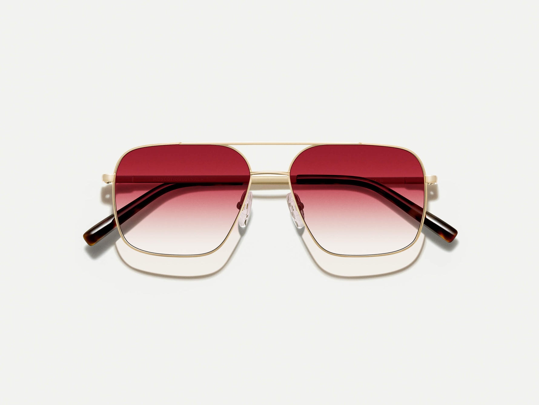 The SHTARKER in Gold with Big Apple Fade Tinted Lenses