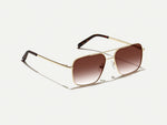 The SHTARKER in Gold with Root Beer Fade Tinted Lenses