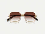 The SHTARKER in Gold with Root Beer Fade Tinted Lenses