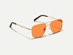 The SHTARKER in Gold with Woodstock Orange Tinted Lenses