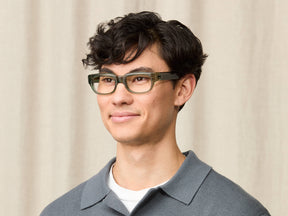 Model in wearing The SHTUP in size 51 in Pine