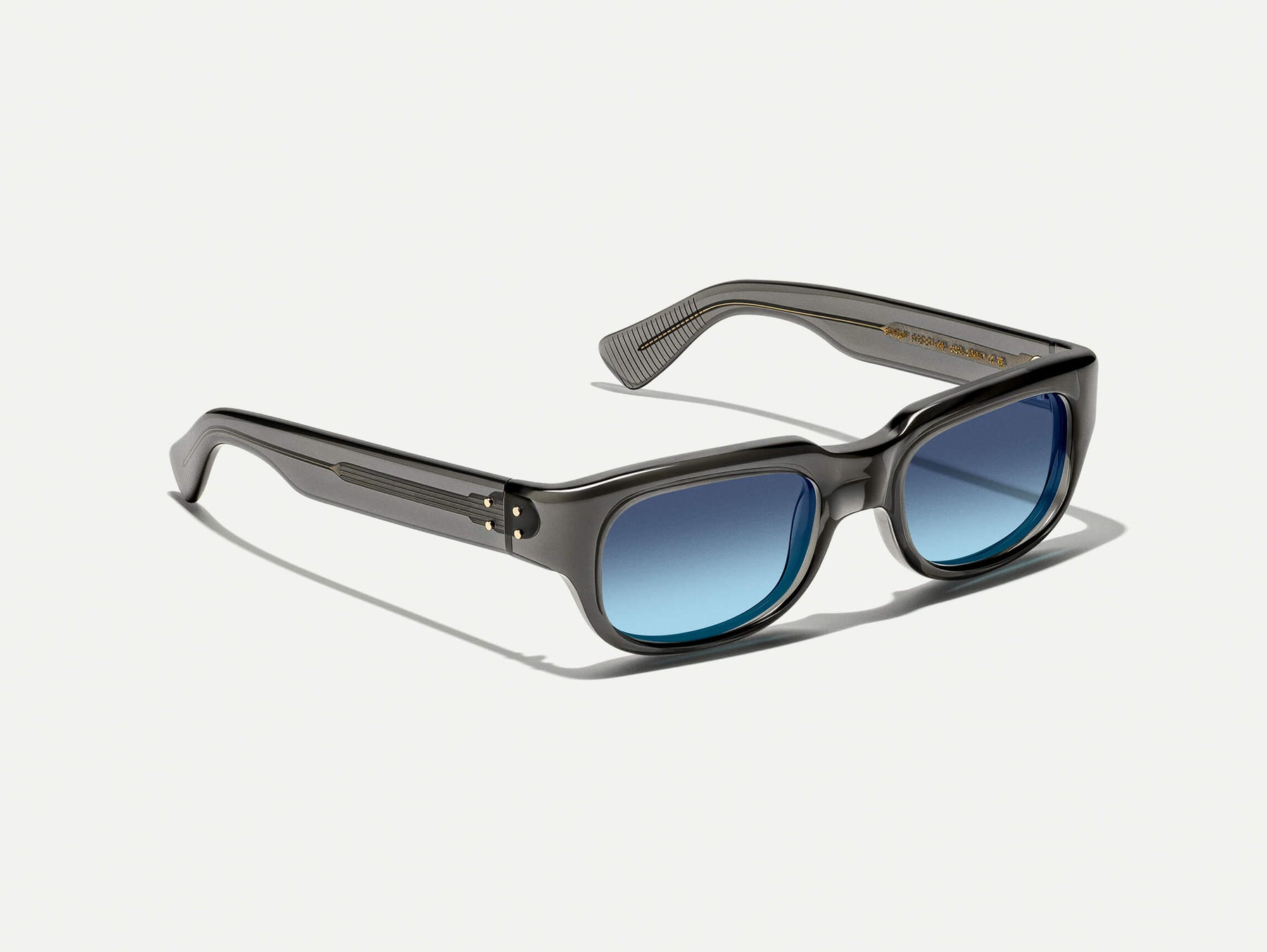 The SHTUP SUN in Grey with Denim Blue Tinted Lenses